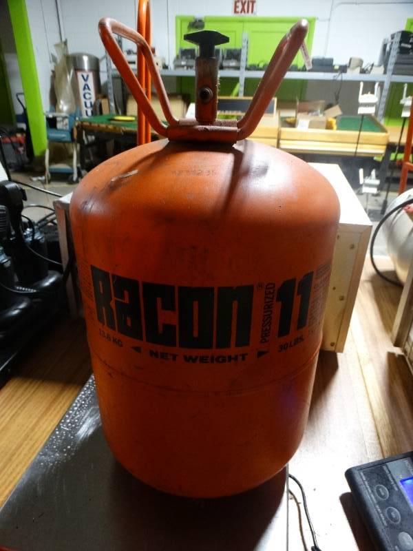 lot 14046 image: 2 partial jugs of R-11 frean- total weight 23 LB