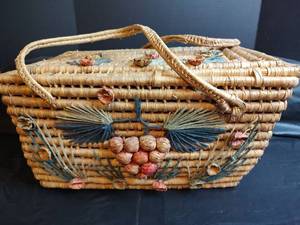 lot 28 image: Native American Woven Basket with Pine Needle Floral Design, 17 x 11