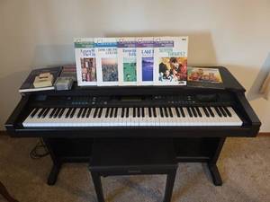 lot 56 image: Yamaha Clavinova CVP59S Digital Piano with Music Books, Disks, Piano Bench, and Dust Cover