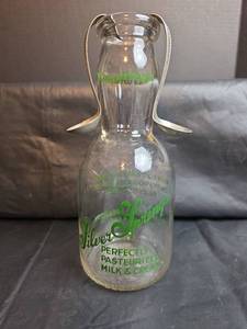 lot 201 image: Silver Springs Creamery Milk Bottle & 2 Cream Spoons