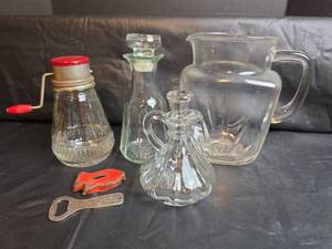 lot 213 image: Glass Nut Grinder, Juice Pitcher, Cruets and More