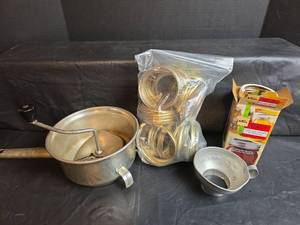 lot 230 image: Kerr Regular Mouth Canning Jar Lids, Aluminum Funnel, Food Mill, and Large Mouth Canning Jar Lids