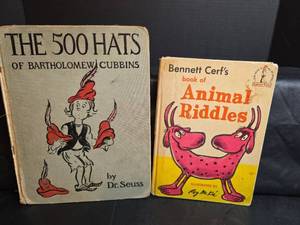 lot 297 image: Dr. Seuss 500 Hats and Bennett Cerf Animal Riddles Book Set