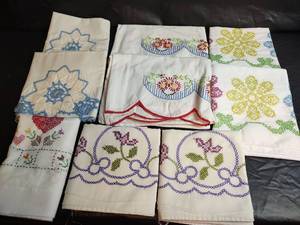 lot 421 image: Vintage Handmade EmbroideredCross-stitched Pillowcase Collection