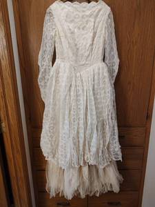 lot 446 image: Vintage 1960s White Lace Wedding Dress with Button Back, Headpiece and Veil Included