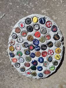lot 462 image: Mixed Beer and Beverage Bottle Cap Collection in Concrete for Outdoors