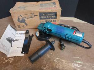 lot 1504 image: Makita N9514B 4-inch Disc Grinder with Manual