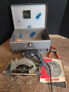 lot 1555 image: Porter Cable Model 345 Circular Saw with Case and Accessories