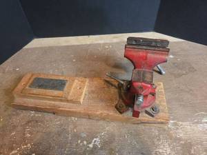 lot 1564 image: Home 204 Bench Vise with Wooden Mount and Whetstone