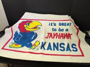 lot 1008 image: Kansas Jayhawks Decorative Throw and White Cotton Blanket.