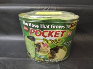 lot 1120 image: NIP Pocket Hose 50ft Expandable Garden Hose