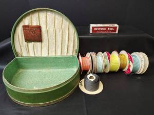 lot 1151 image: Mid-Century Sewing Kit with Ribbons and Awl