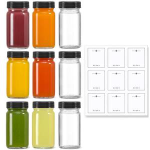 lot 7770 image: 9 Pack, 2 oz Glass Shot Bottles w Black Lids & 9 Labels - Small Clear Jar for Ginger, Wellness Shot, Juice, Sample, Whiskey - Travel Essentials Mini Bottles - Wide Mouth, Leakproof, Dishwasher Safe