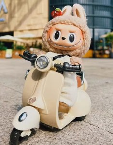 lot 7686 image: Simgoing 1 Pcs Doll Scooter Doll Vehicles Mini Electric Scooter with Music &amp Lights Could Rotate 360° Dolls Accessories Cute Scooters Ornaments Battery Not Included (Cream)