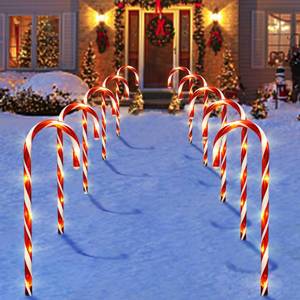 lot 1194 image: Bstge Christmas Decorations Outdoor, 10 Pcs Candy Cane Lights, 21 Solar Pathway Lights with 8 Lighting Modes, Waterproof Garden Lights for Christmas Patio Yard Walkway Decorations