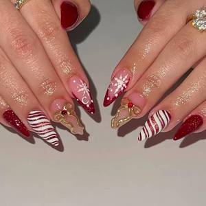 lot 1353 image: Christmas Press on Nails Medium Almond 3D Fake Nails Christmas Snowflake Gold Bow Design,Red White Stripe Nails Press ons Acrylic Glue On Nails,Manicure Stick on Nails for Women Holiday Party