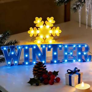 lot 1496 image: 7Pcs Winter Snowflake LED Marquee Light Up Letters Sign Winter Christmas Letter Lights Snowflake Table Decorations Battery Powered LED Lights for Home Indoor Fireplace Wall Holiday Party Decoration