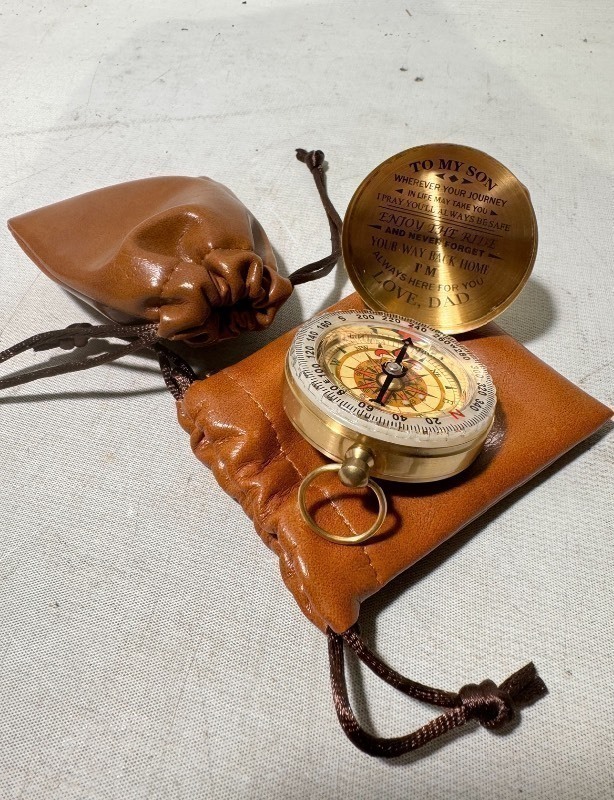 lot 262 image: 2 New To My Son, Love Dad Gold Compasses w Protective Leather Sheaths. Come as is as pictured new great gift.