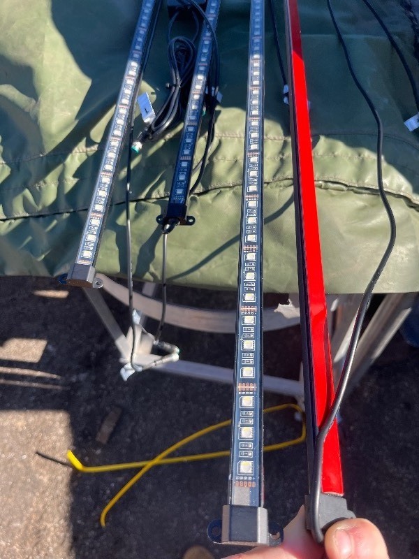 lot 20 image: 4 LED RGB Lighting Tracks - Could Use anywhere - Appears to Possibly be UnderGlow Kit for Vehicles, contains direct battery hook up