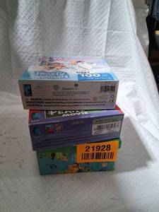 lot 21928 image: Kids Movie Puzzle Collection - Frosty, Peanuts & World Map