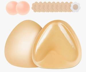 lot 1152 image: Dersoud Sticky Bra Inserts - Soft Invisible Reusable Double Sided Sticky Bra for Women with Lift Support, Washable for Bikini, Swimsuit, Wedding, Strapless Dress Beige, B - Retail $19