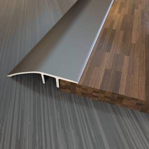 lot 1166 image: Aluminum Floor Transition Threshold Strip, DoorCarpetTileThreshold Reducer, Doorway Edge Trim for Laminate Floor Mat Carpet and Vinyl Tile (Gray, 36Inch) - Retail $20