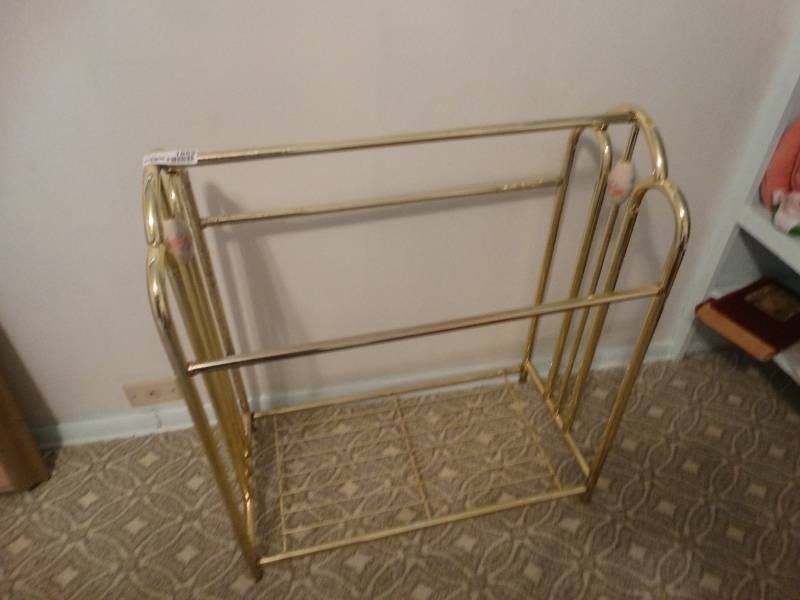 Brass quilt rack. West Wichita Estate Auction Furniture