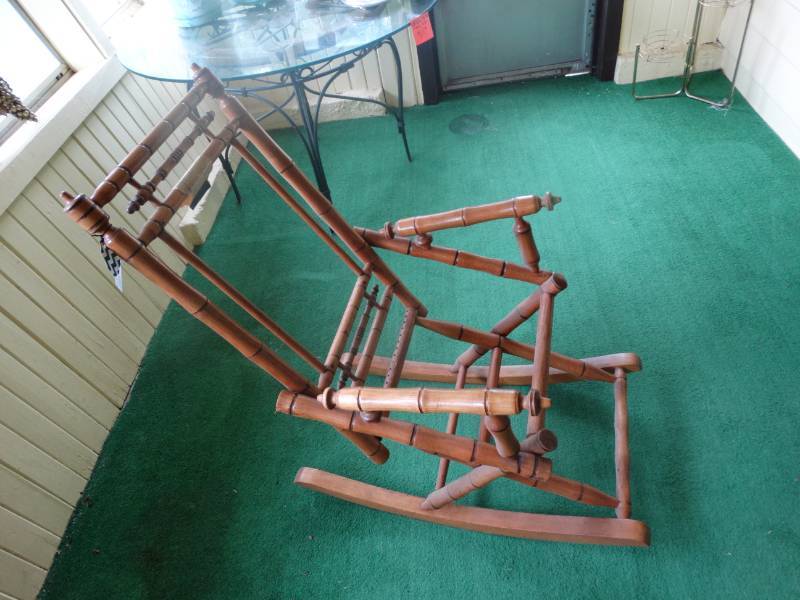 lot 1933 image: Antique spindle rocker.