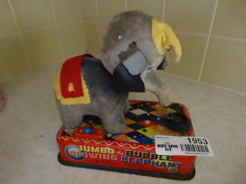 lot 1953 image: Jumbo blowing bubble elephant.