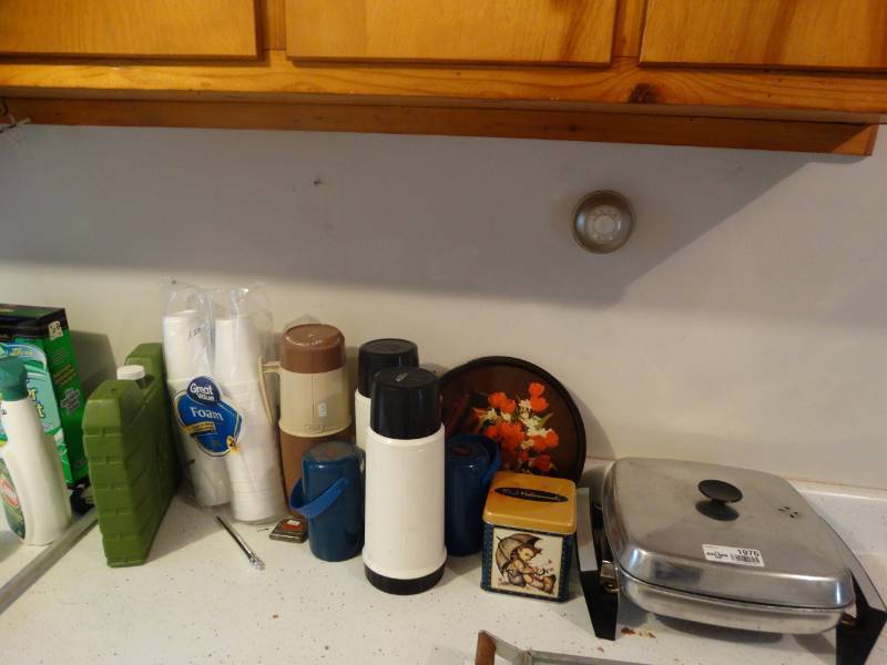 lot 1976 image: Lot of diahwasher detergent, foam cups, thermos containers, etc.