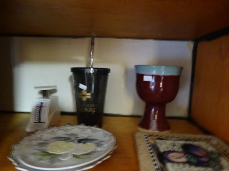 lot 17004 image: Cotents in cabinet.