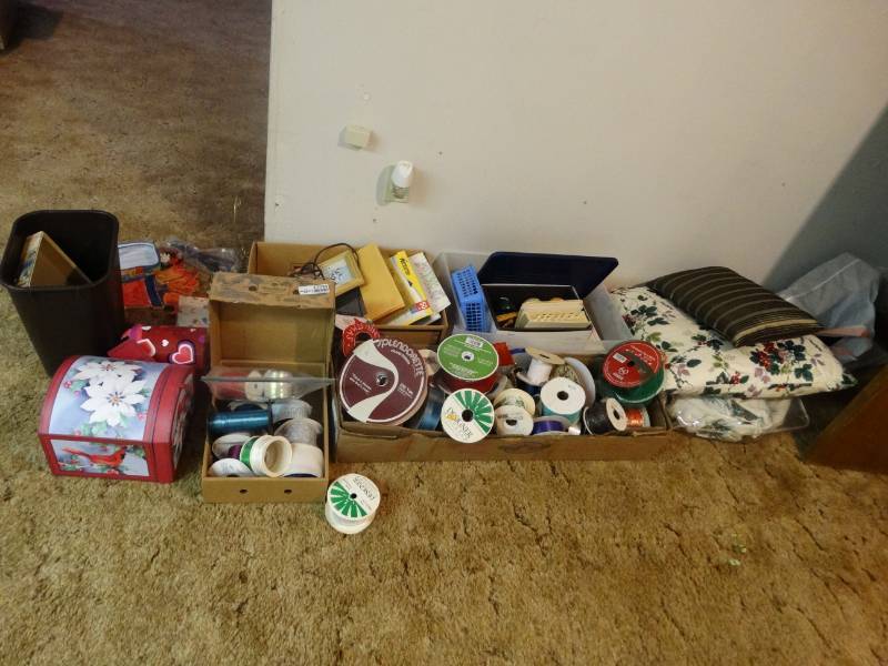 lot 17038 image: Lot of ribbon, pillows, boxes, small trash can, etc.