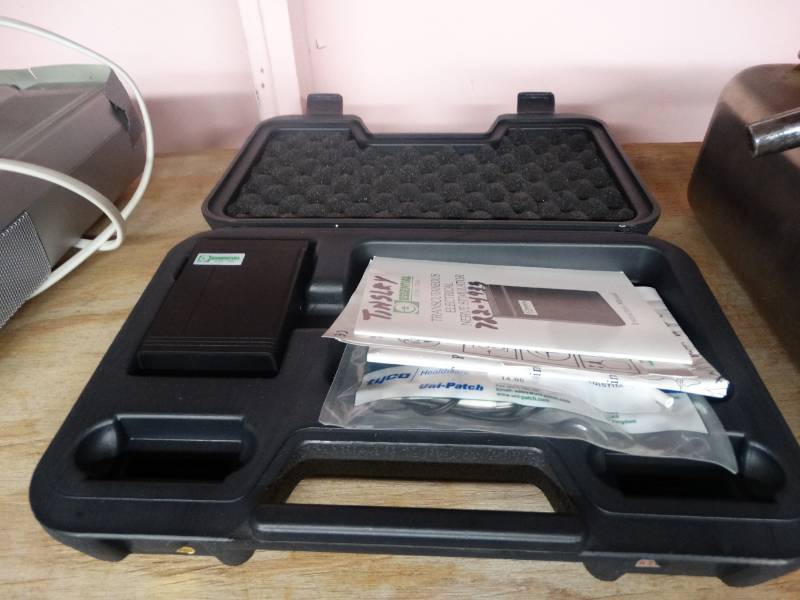 lot 17070 image: Transcutaneous electrical nerve stimulator.