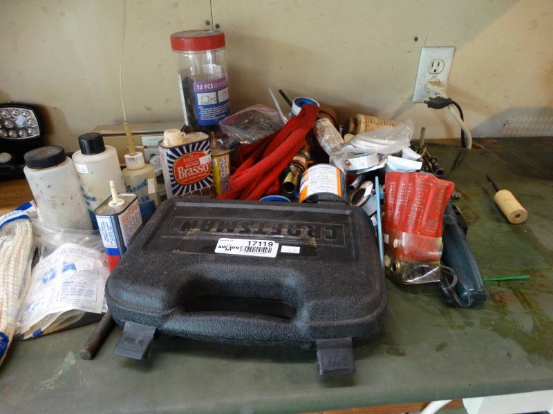 lot 17119 image: Lot with clothesline, WD-40 samples, string, metal polish, etc.