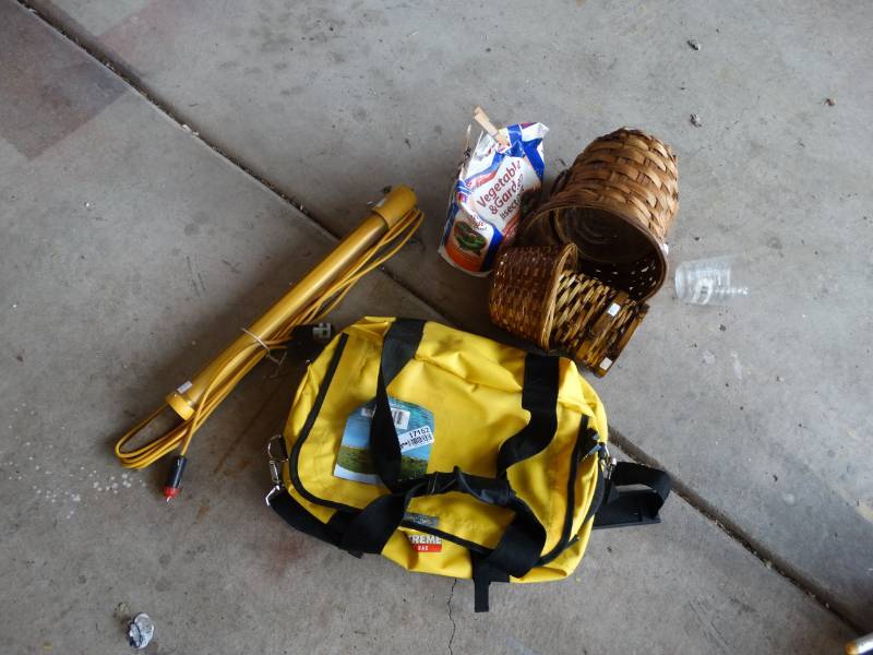 lot 17152 image: Bass pro shope extreme bag, shop light, baskets, Veggie and garden insect dust.