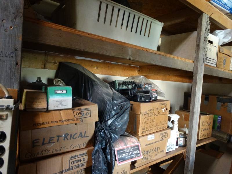 lot 17186 image: Lot of Chemicals, eletrical, automotive parts, kawasaki parts, meters, & more.