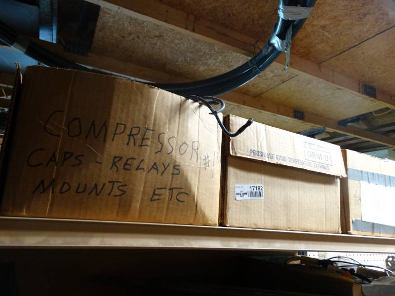 lot 17192 image: Compressor, caps, mounts, small engine parts & more.