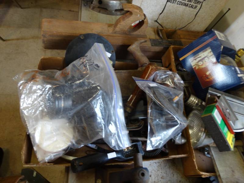 lot 17221 image: Atique plane, saw, hand drills, lights, planes, & more.