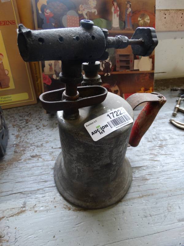 lot 17223 image: Antique torch.