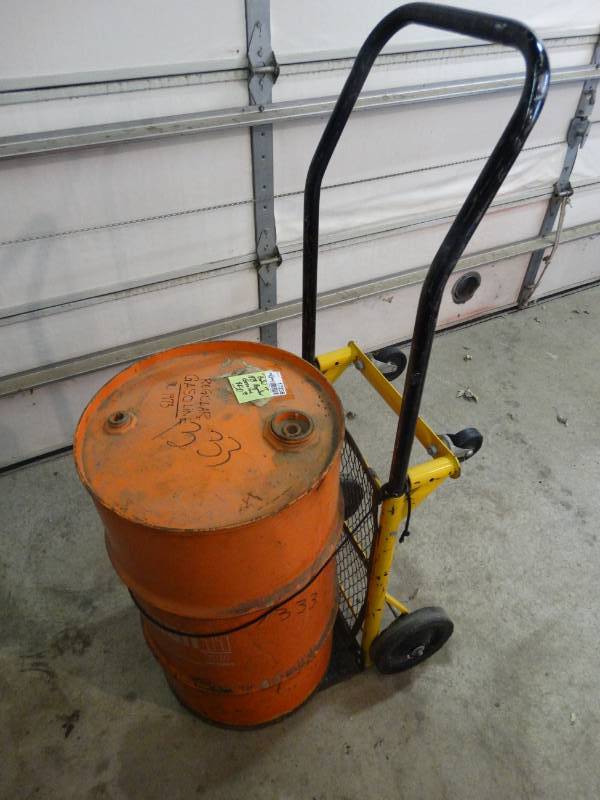 lot 17236 image: Barrel of 1973 reguler gasoline wdolly.