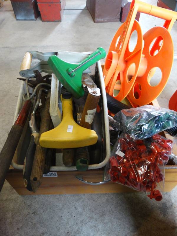 lot 17242 image: Extension cords spool,small garden tools, sprinker.