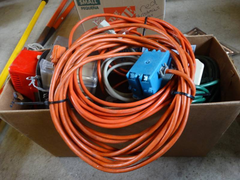 lot 17245 image: Extension cords, new gloves, bungy cords, & more.