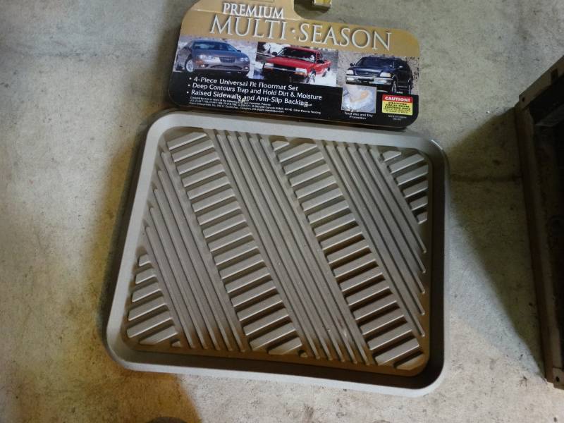 lot 17250 image: Premium multi-season mats.