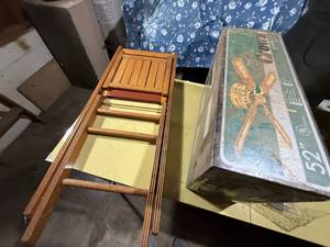 lot 1374 image: NEW 52 CELINING FAN WOOD FOLDING CHAIR..................GAR