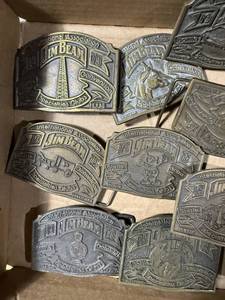 lot 1458 image: Jim Beam collectible belt buckles - GAR