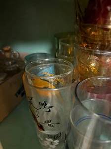 lot 1623 image: MISC CABINET OF  DISHES, GLASSES, SAUCERS.............KTCN
