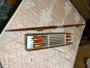 lot 1630 image: Long bow and arrows - NBD