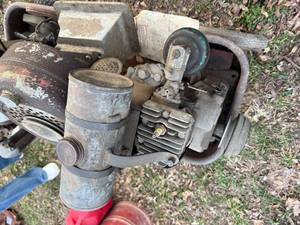 lot 1577 image: VINTAGE RED WAGON WITH 3 VINTAGE GAS MOTORS..............................BY
