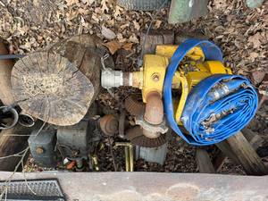 lot 1746 image: Water transfer pump, hog oiler & old engine -- BY