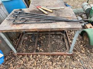 lot 1748 image: Metal shop table with plant hanger -- BY